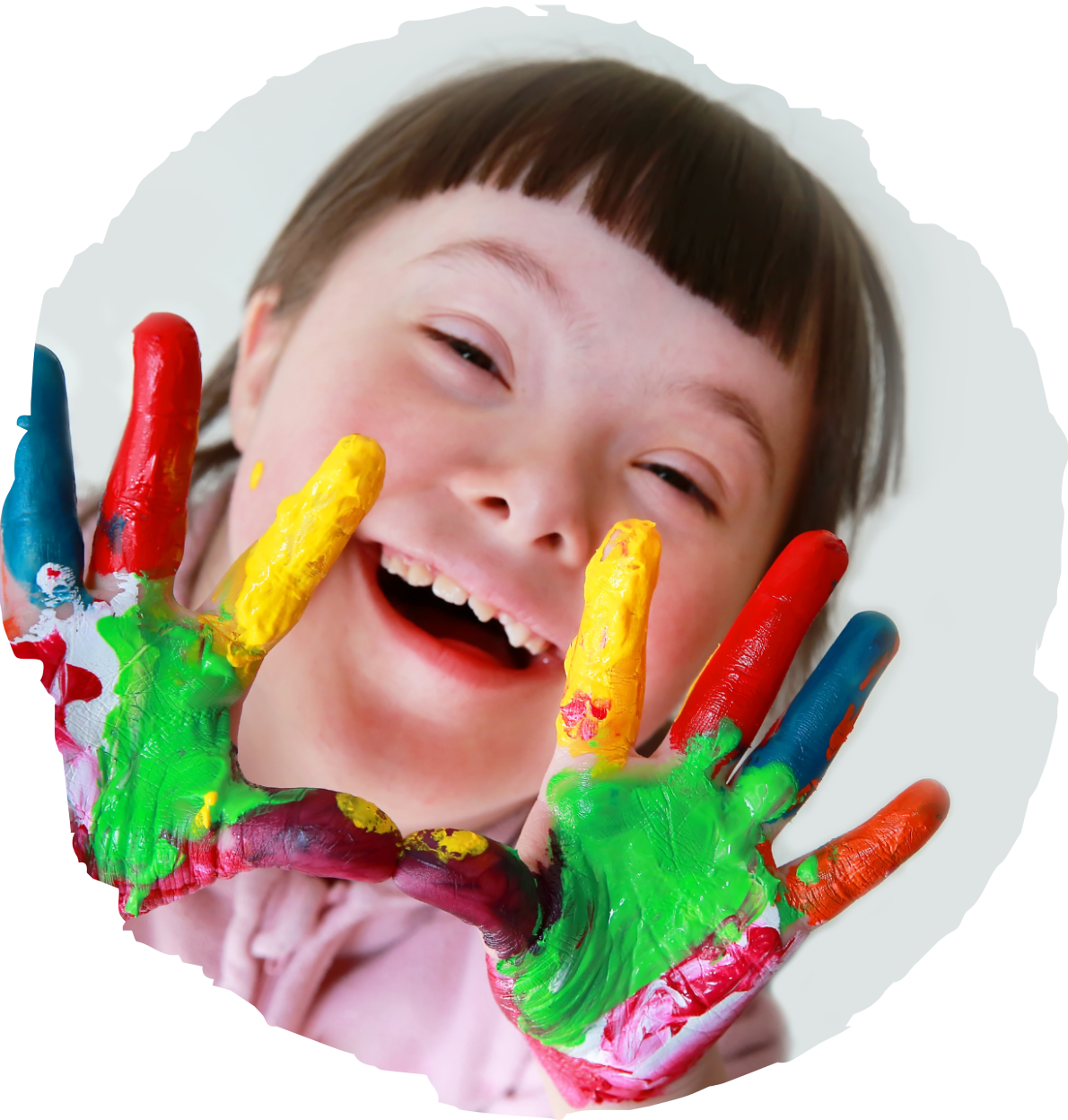 A little girl with painted hands on her face.